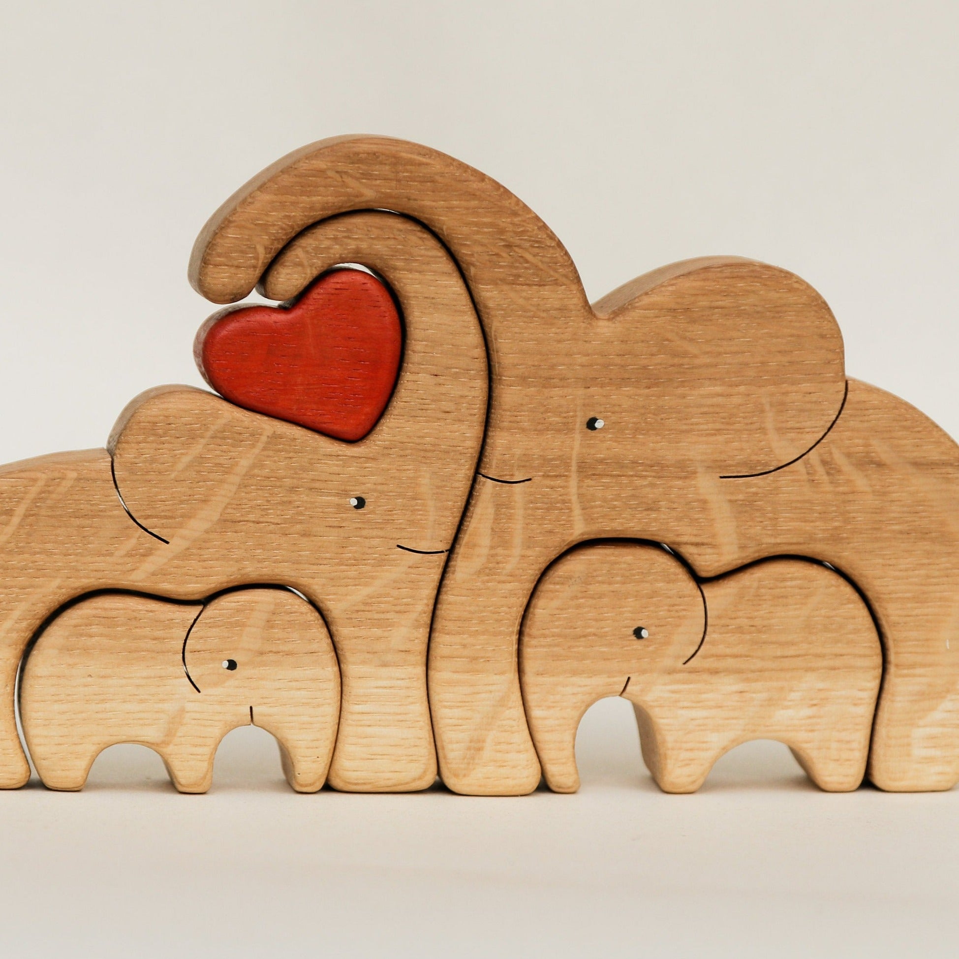 Wooden elephants family puzzle