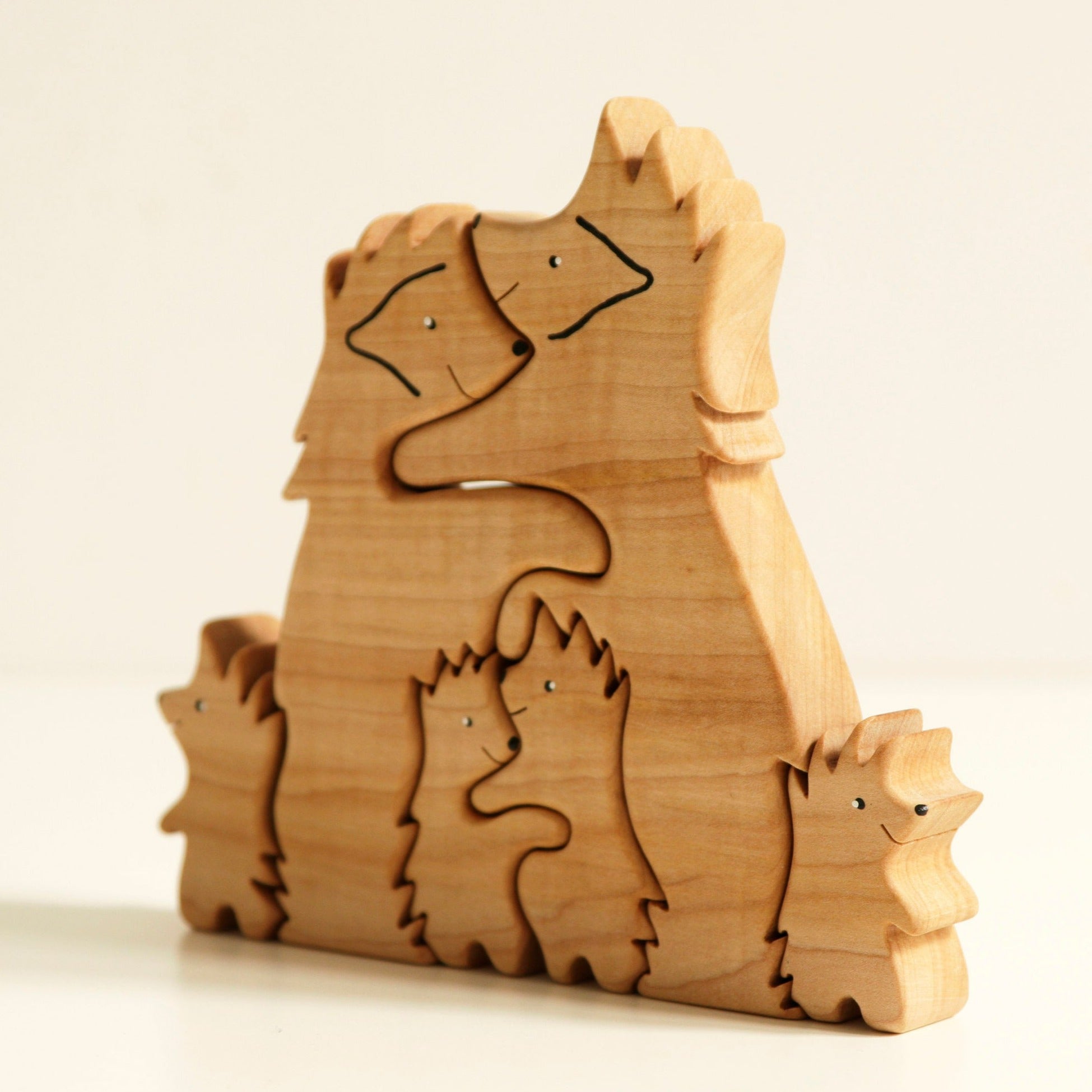 Wooden hedgehogs family puzzle